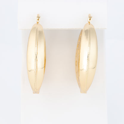 Hoop Earring With A Different Texture And Oval Designs