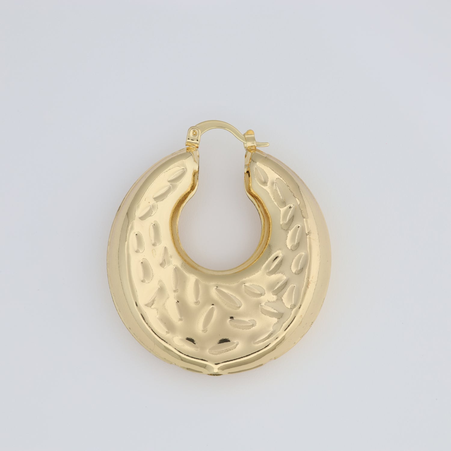 Hoop Earring With A Different Texture And Oval Designs