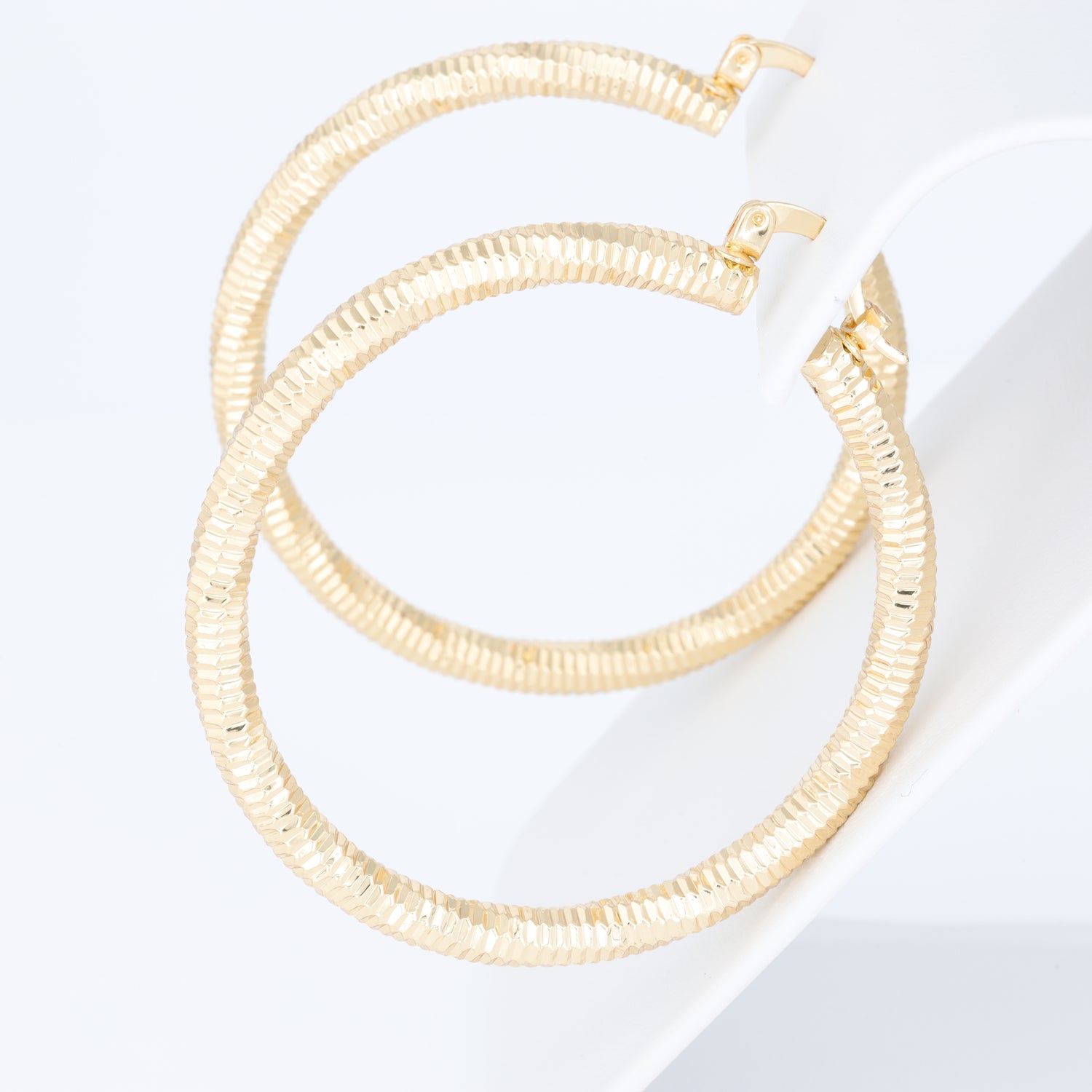 Hoop Earring With A Unique twisted