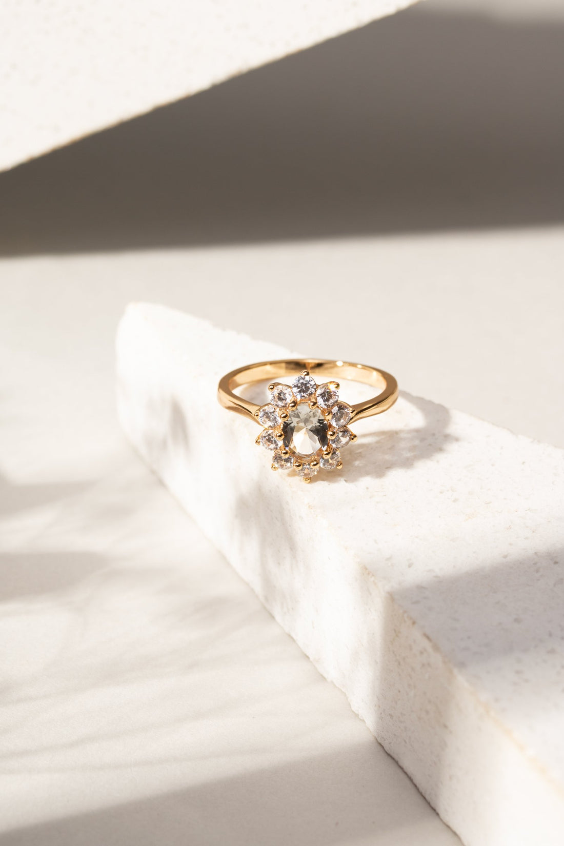 Oval Beryl & White Zirconia Halo Ring